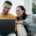 Home laptop, smile and relax couple search internet
