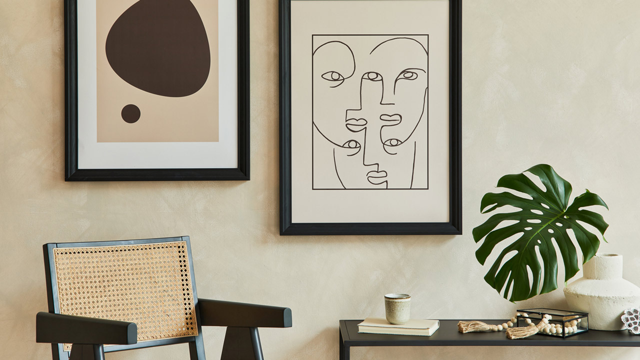 Creative composition of stylish modern living room interior with two mock up poster frames