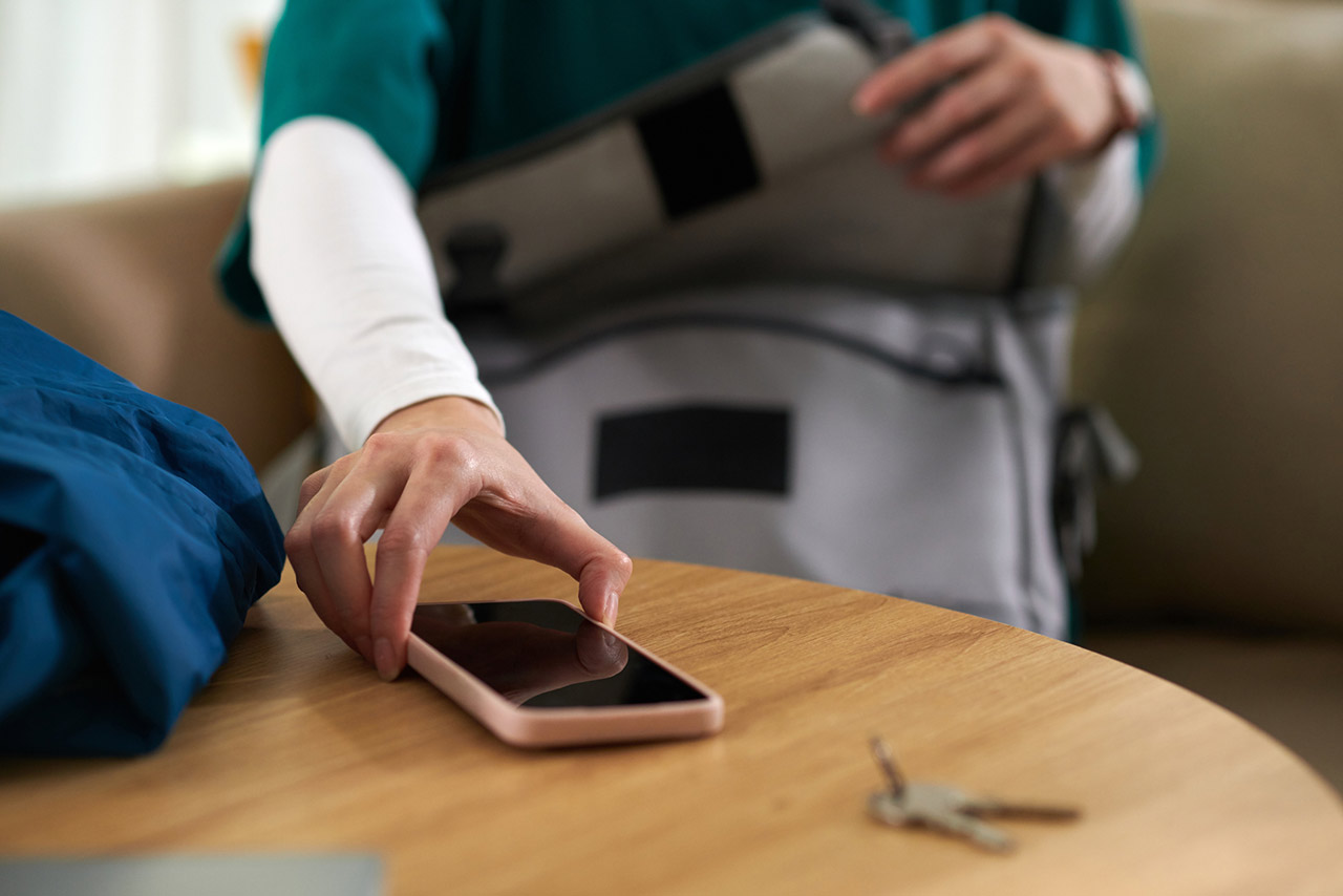 Woman Packing Bag for Work stock photo